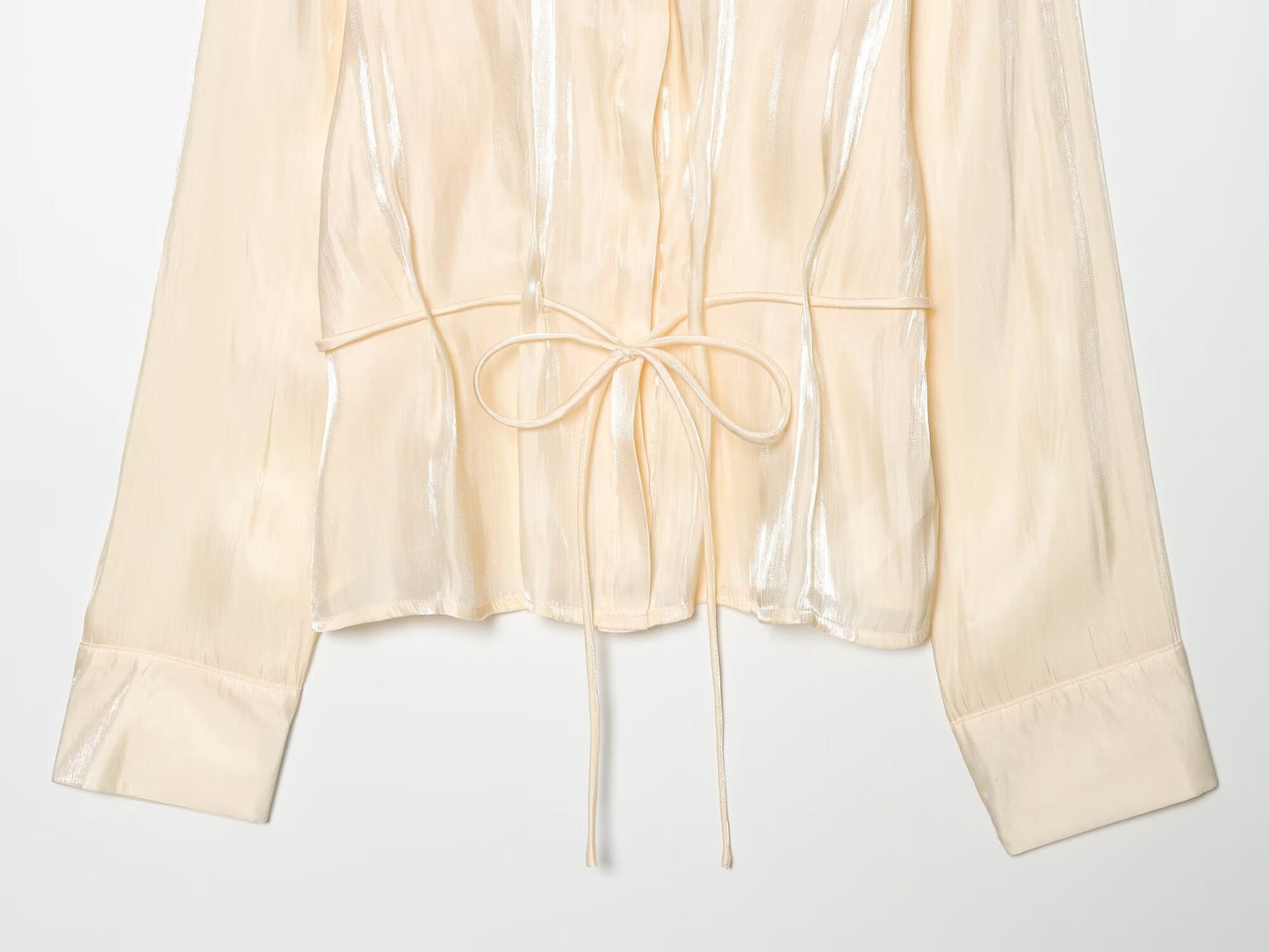 Women's metallic effect paired with belt shirt