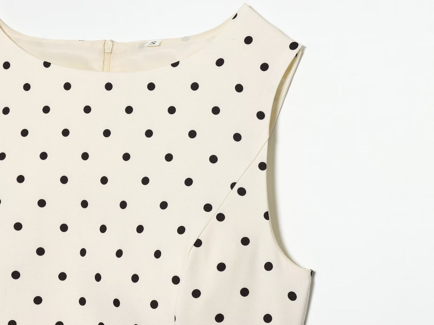 Women's ruffled hem polka dot sleeveless top