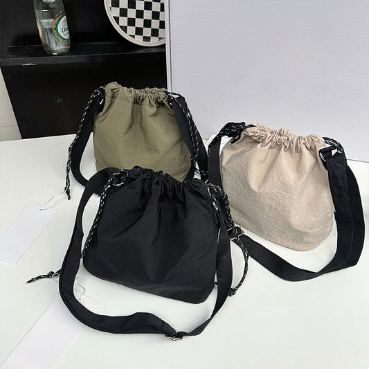 LU New Leisure Shoulder Slung Adjustable Speed Dry Waterproof Small Bag. (Upper Width: 24.5cm Lower Width: 20.5cm Height: 19.5cm)