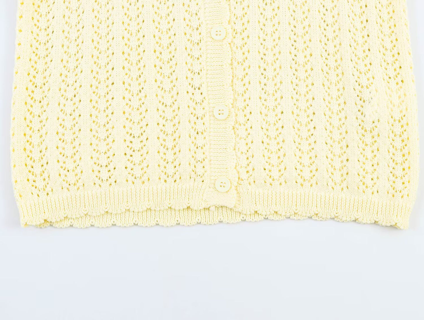 Women's short sleeved hollow knitted cardigan
